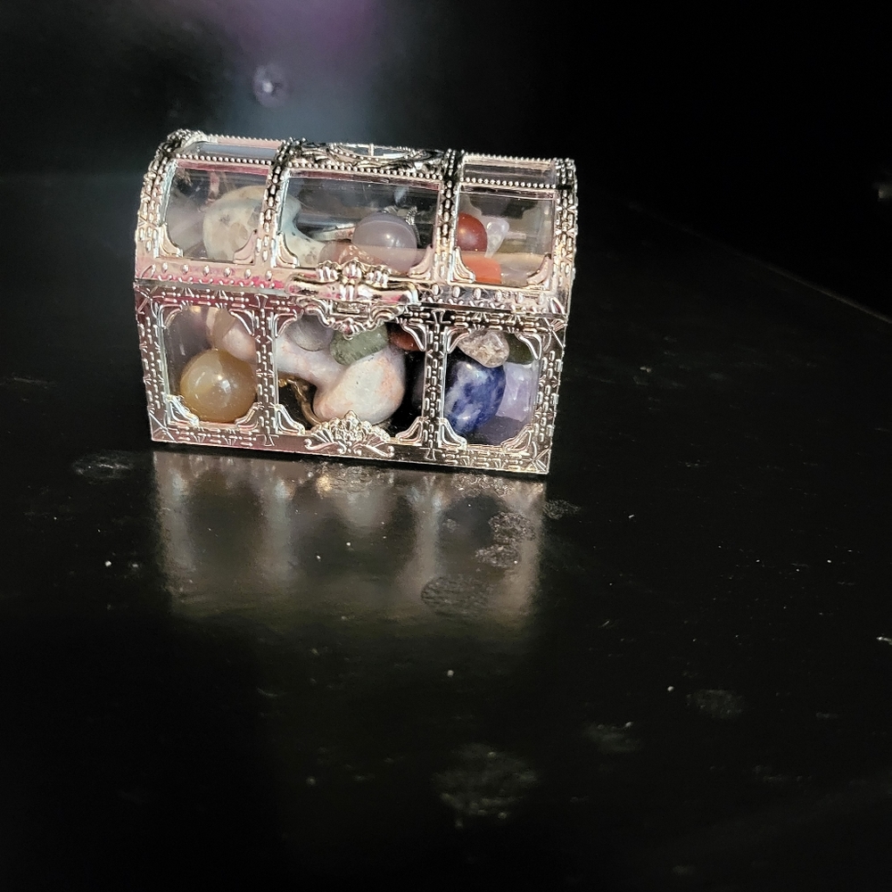 Treasure chest with crystals and rings.